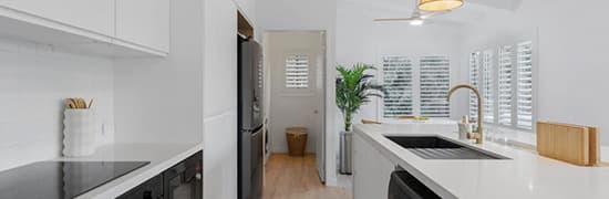 Kitchen window with PVC shutters